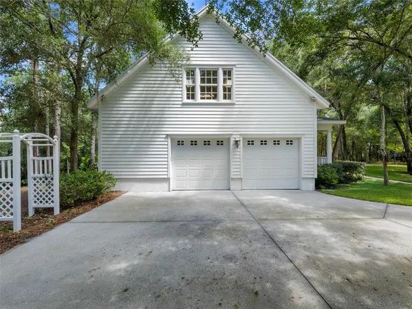 front view of a house with a garden