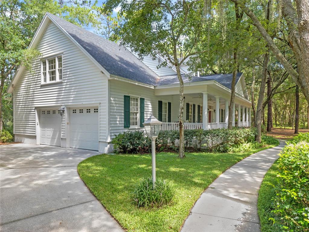 4000 Rouse Road Orlando, FL 32817 - Photo 47 of 53 a front view of a house with a yard