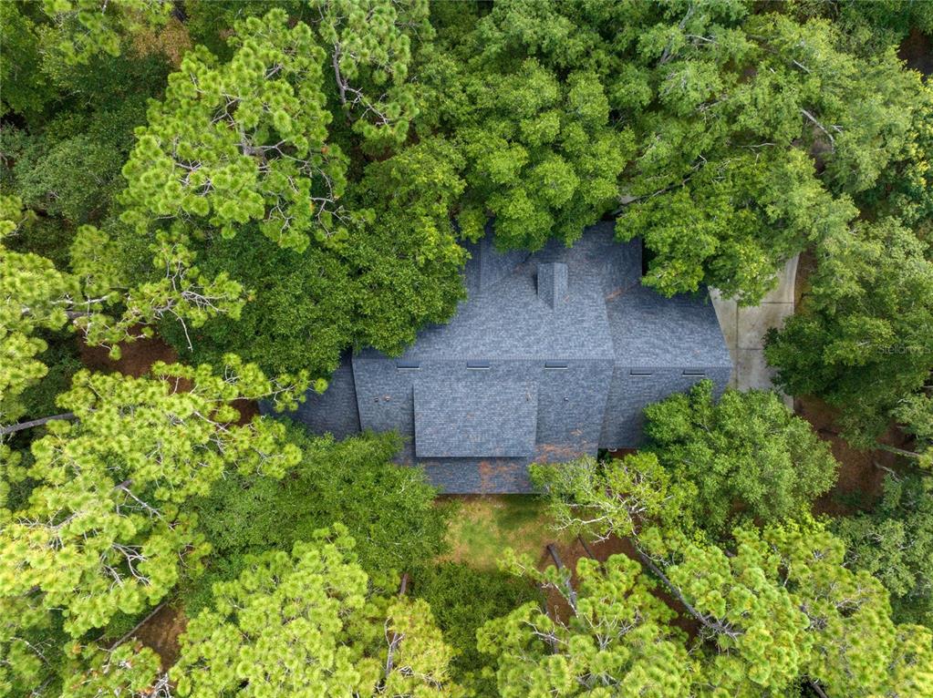 4000 Rouse Road Orlando, FL 32817 - Photo 51 of 53 an aerial view of a house with a yard