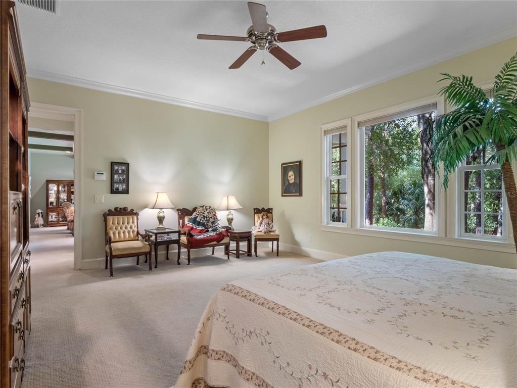 4000 Rouse Road Orlando, FL 32817 - Photo 10 of 53 a bedroom with furniture and a large window
