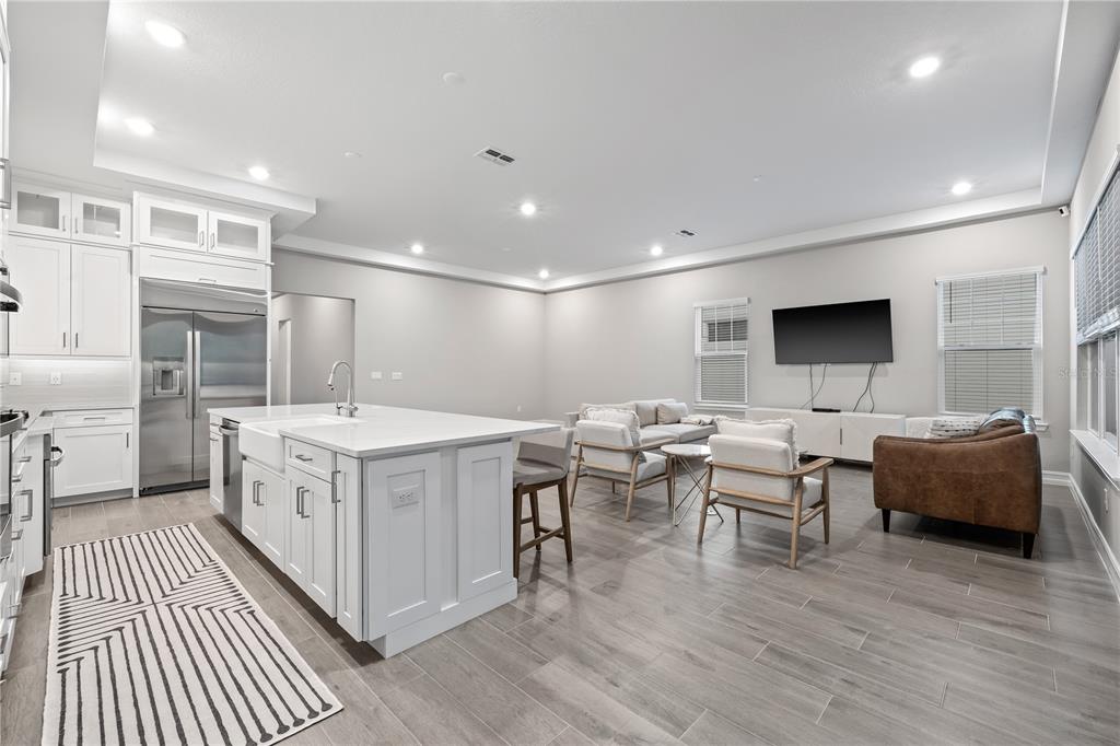 2632 Yellow Sundial Loop Ruskin, FL 33570 - Photo 20 of 52 a bathroom with a double vanity sink and a mirror