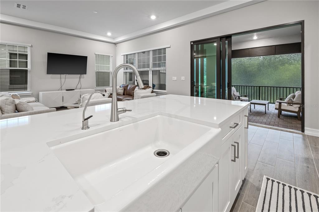 2632 Yellow Sundial Loop Ruskin, FL 33570 - Photo 22 of 52 a bathroom with a tub sink and mirror