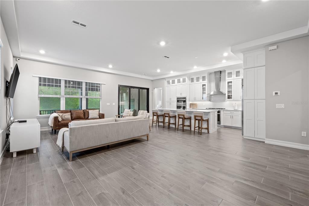 2632 Yellow Sundial Loop Ruskin, FL 33570 - Photo 10 of 52 a living room with furniture and a large window