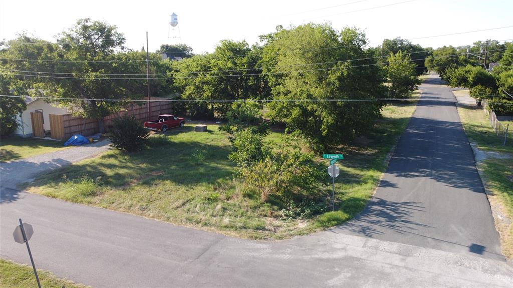 229 East 7th Street Anna, TX 75409 - Photo 2 of 7 a view of a backyard