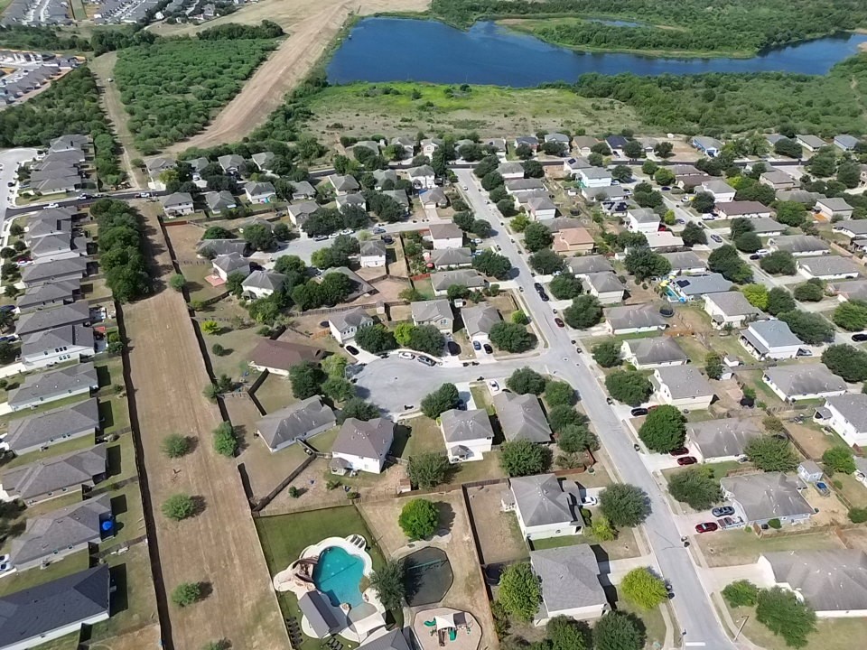 117 Waterloo Drive Kyle, TX 78640 - Photo 39 of 39 an aerial view of multiple houses with yard