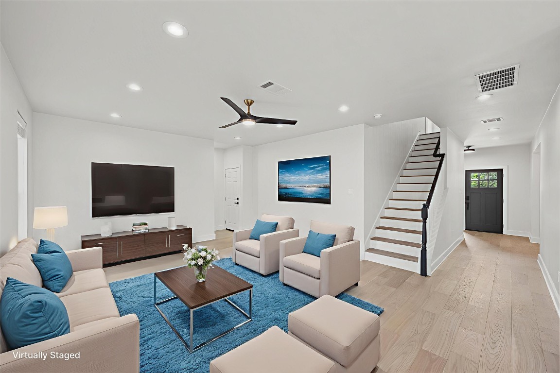 117 Waterloo Drive Kyle, TX 78640 - Photo 5 of 39 a living room with furniture and a flat screen tv