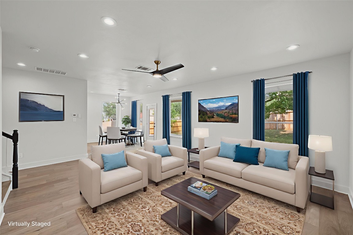 117 Waterloo Drive Kyle, TX 78640 - Photo 7 of 39 a living room with furniture and a ceiling fan