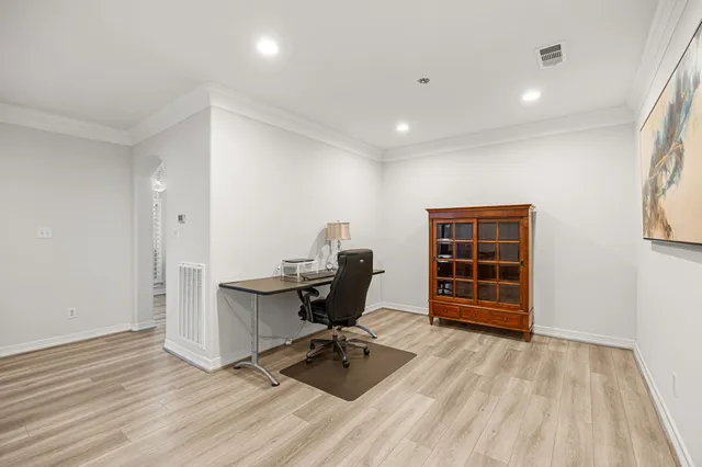 a view of workspace with wooden floor shelves