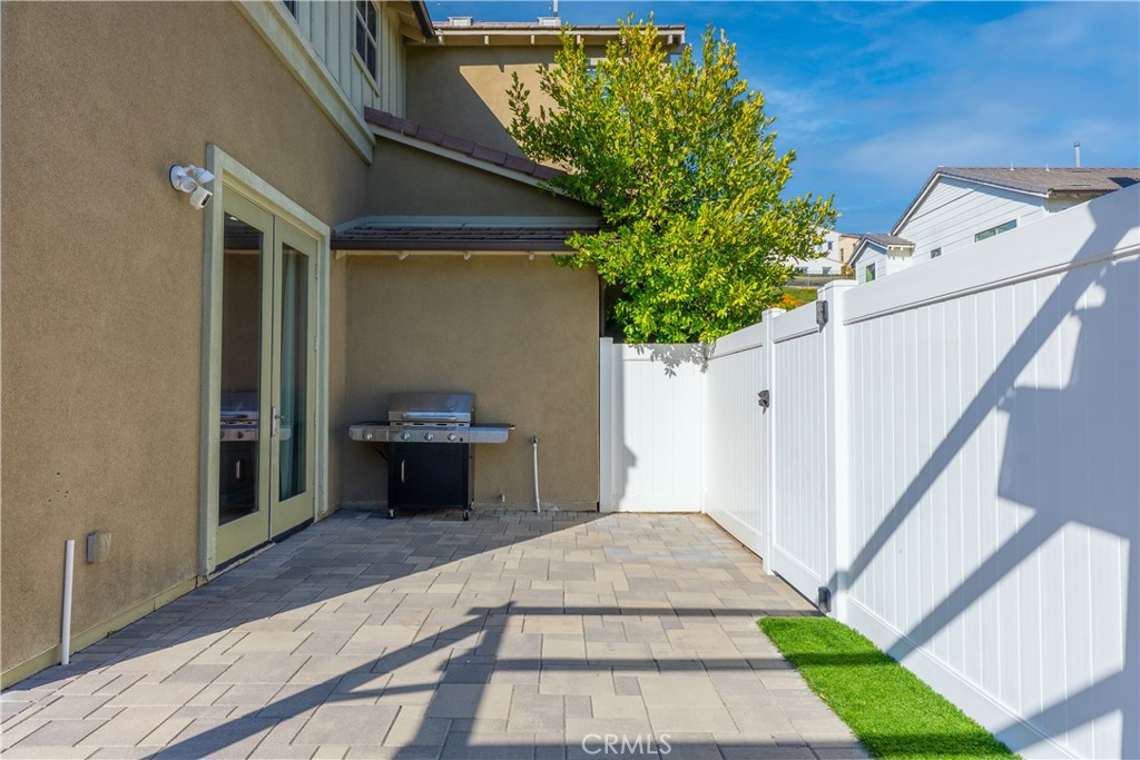 102 Marisol Street Rancho Mission Viejo, CA 92694 - Photo 19 of 75 a bedroom with a bed and a potted plant