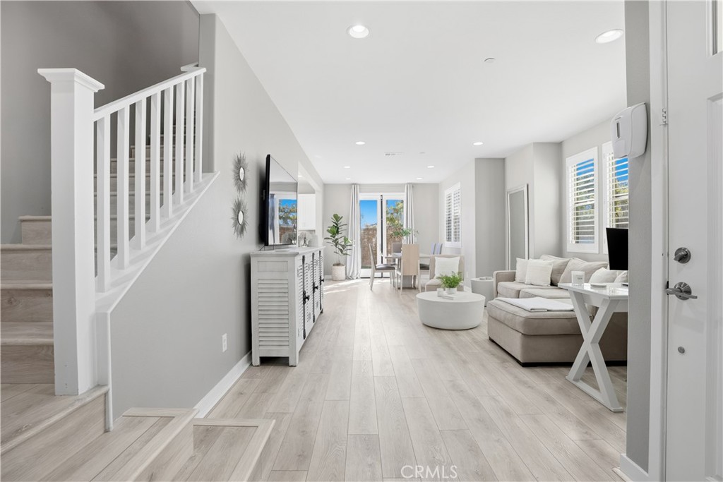 102 Marisol Street Rancho Mission Viejo, CA 92694 - Photo 10 of 75 a living room with furniture and wooden floor