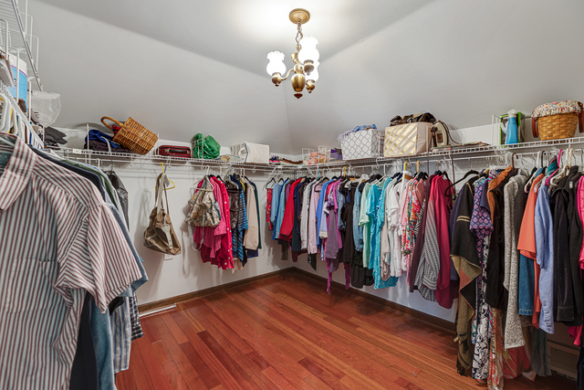2S225 County Line Road Maple Park, IL 60151 - Photo 22 of 27 a view of walk in closet with clothes