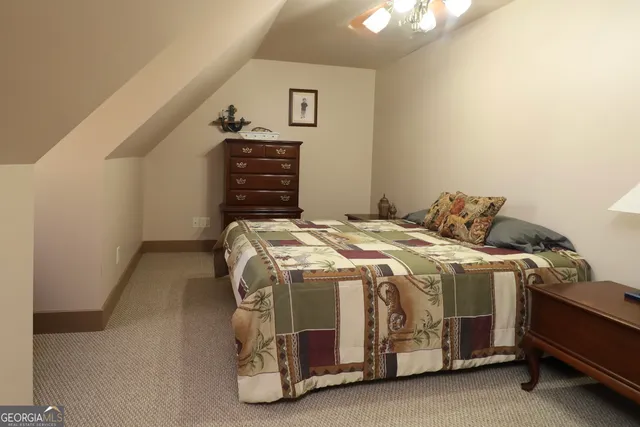 a bathroom with a double vanity sink mirror and shower