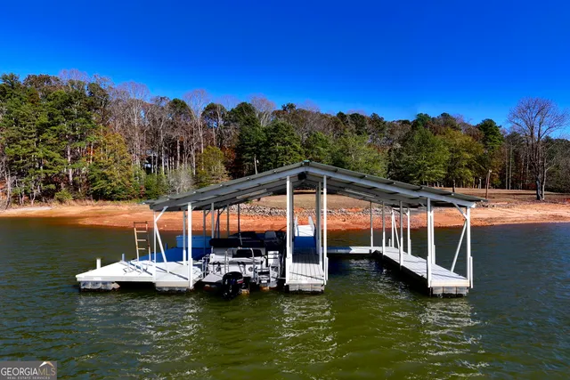 a view of a ocean with a mountain in the background