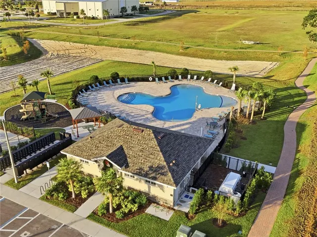 a view of a swimming pool with an ocean view