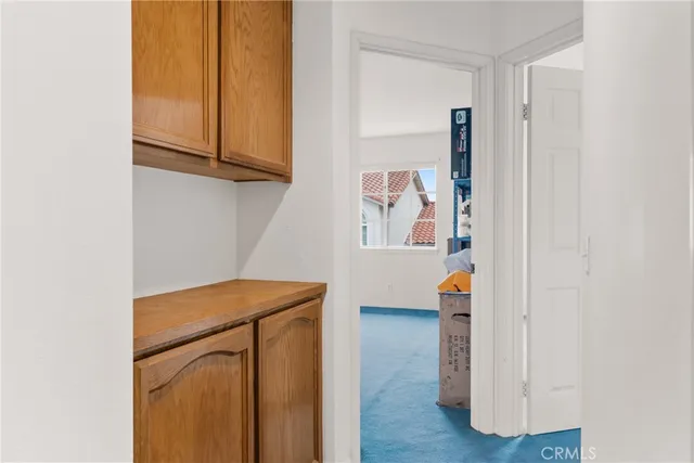 a view of walk in closet with window
