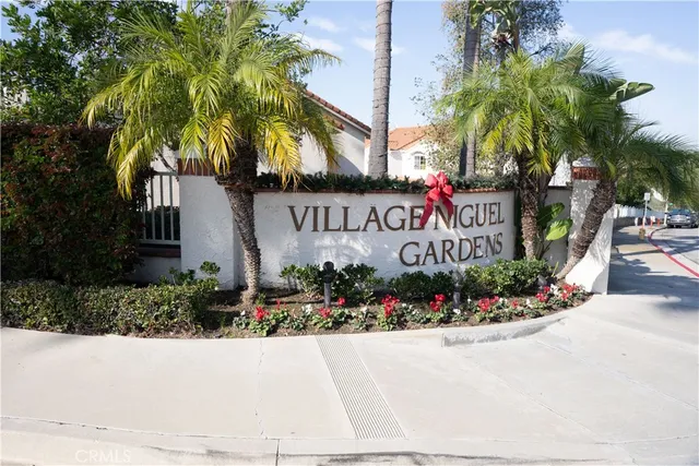 a street sign on the side of building