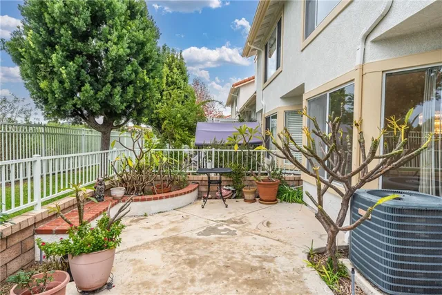 a view of a balcony with chairs