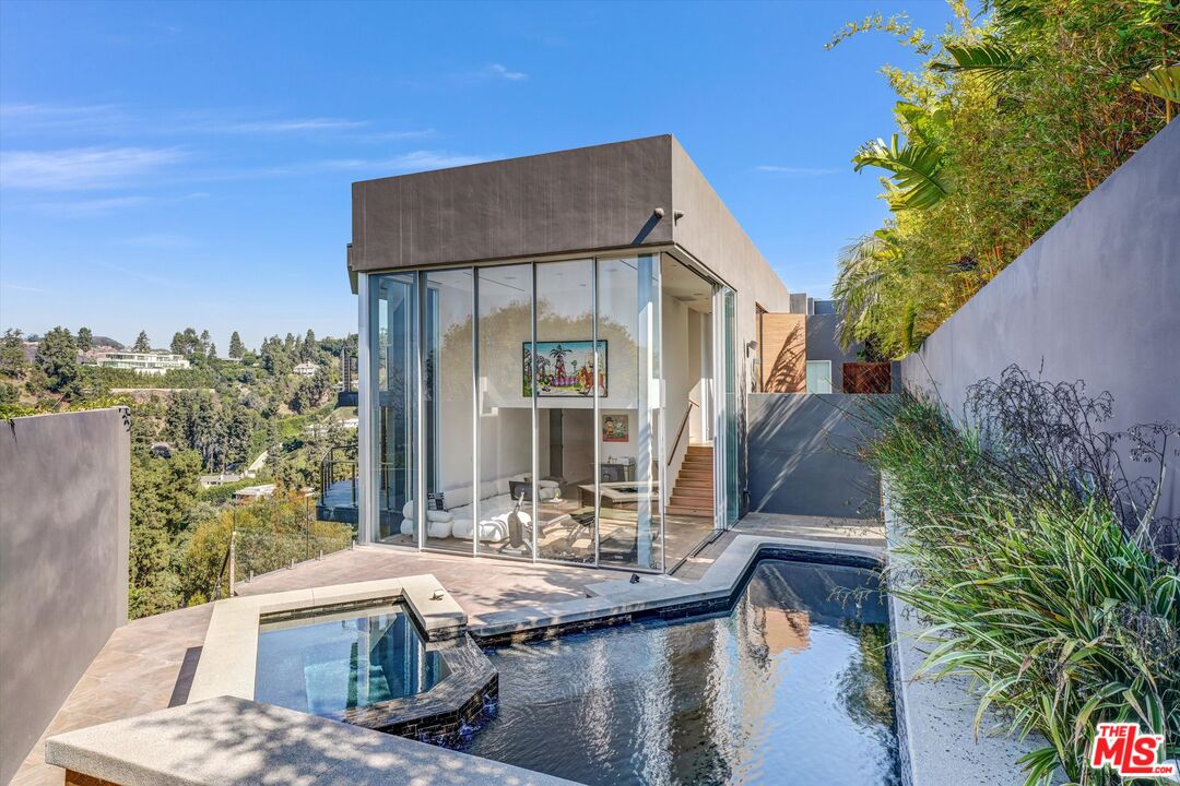 9400 Readcrest Drive Beverly Hills, CA 90210 - Photo 28 of 33 a view of house with yard outdoor seating and lake view