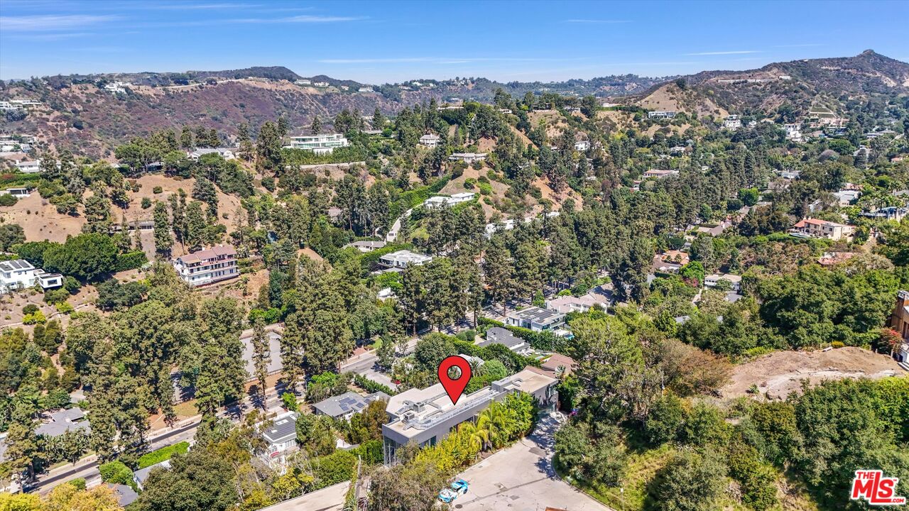 9400 Readcrest Drive Beverly Hills, CA 90210 - Photo 32 of 33 an aerial view of residential houses with outdoor space and trees