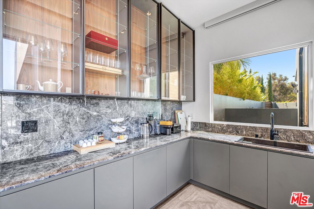 9400 Readcrest Drive Beverly Hills, CA 90210 - Photo 8 of 33 a kitchen with a sink and a window