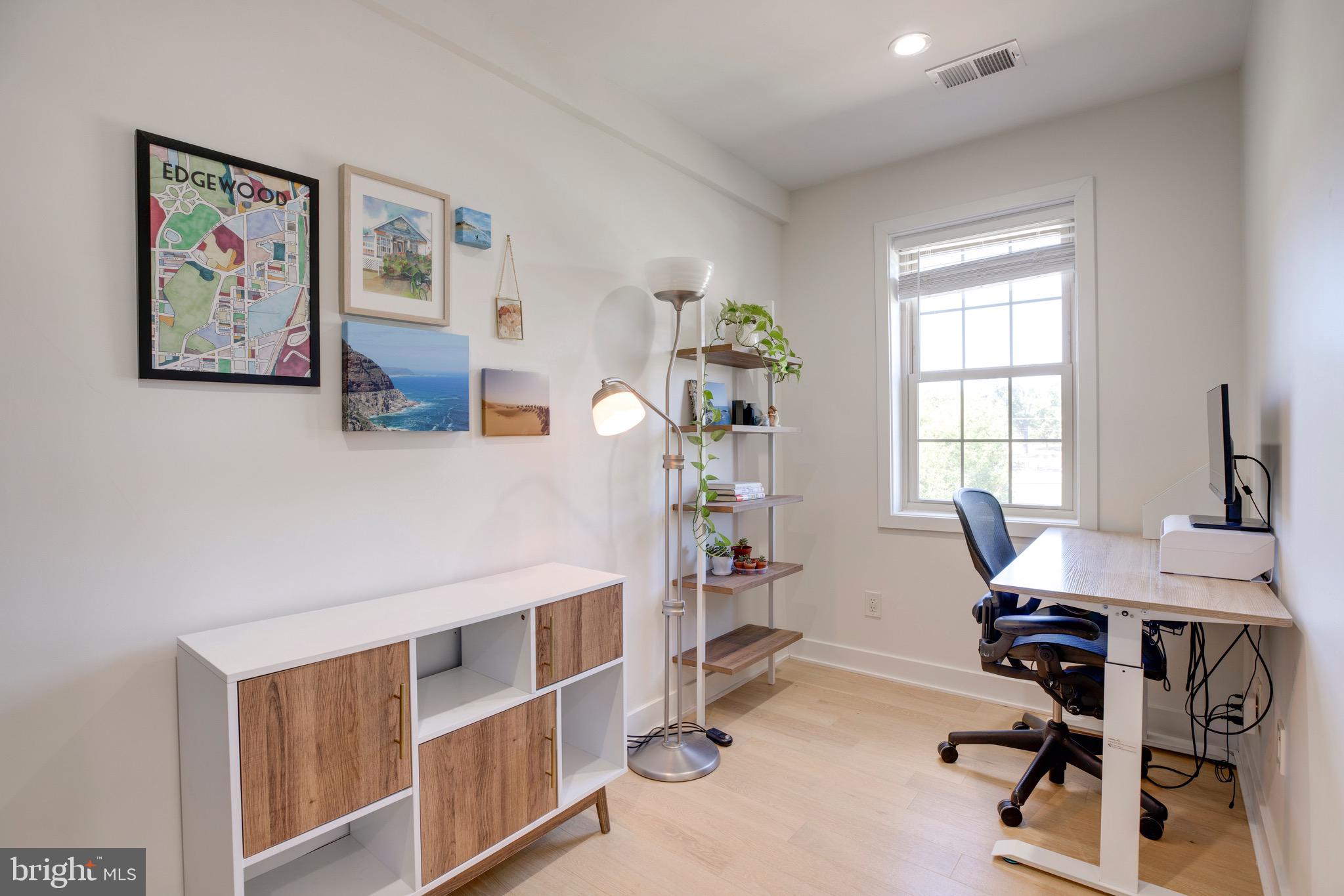 2625 3rd Street Northeast, Unit 203 Washington, DC 20002 - Photo 12 of 25 a view of a workspace with furniture and a window