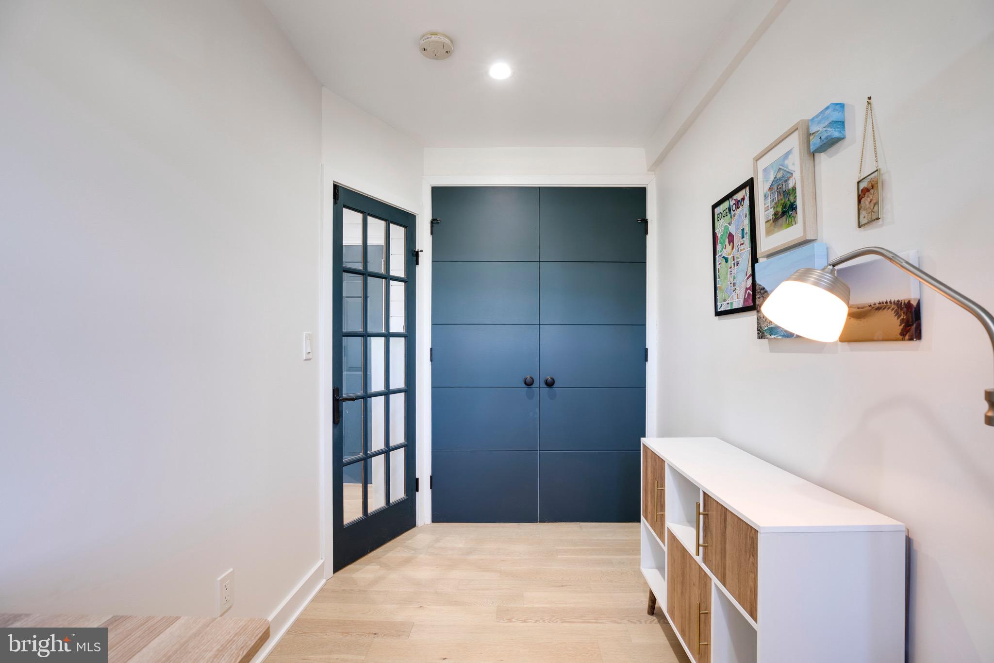 2625 3rd Street Northeast, Unit 203 Washington, DC 20002 - Photo 13 of 25 a bedroom with a bed and a dresser
