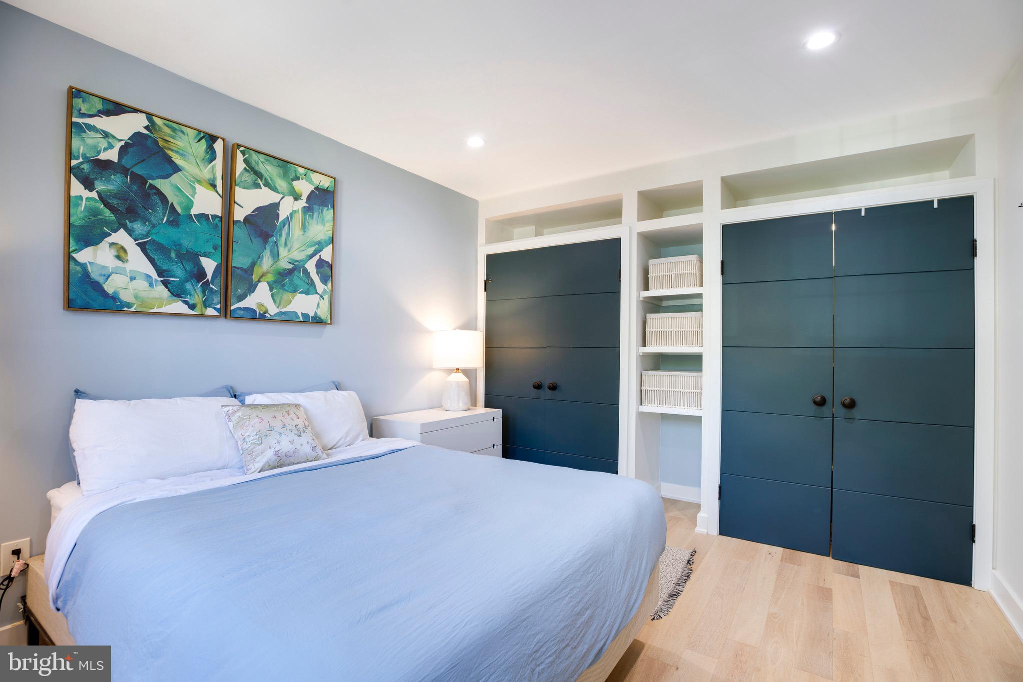 2625 3rd Street Northeast, Unit 203 Washington, DC 20002 - Photo 17 of 25 a bedroom with a bed and a window