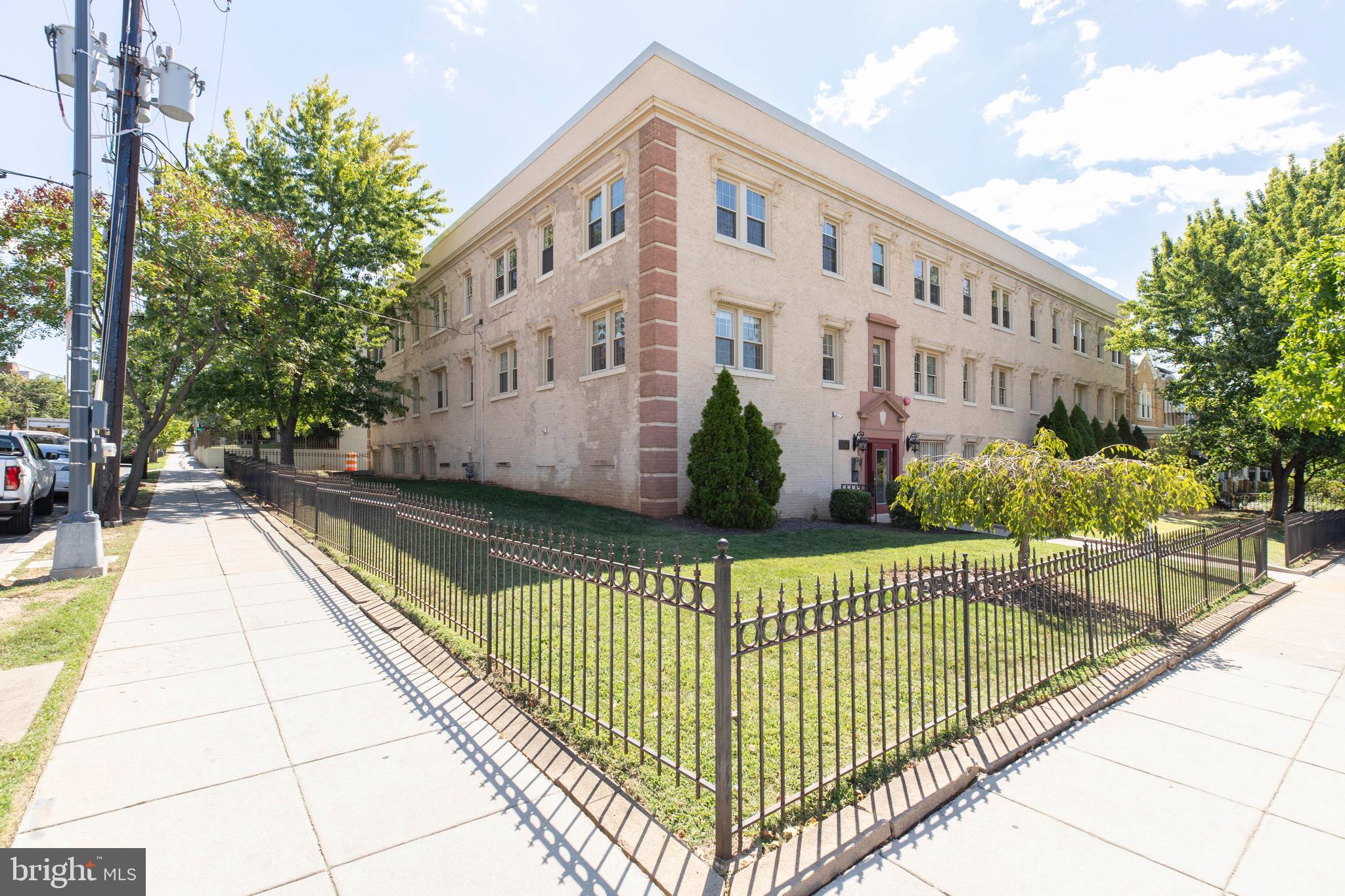 2625 3rd Street Northeast, Unit 203 Washington, DC 20002 - Photo 22 of 25 a view of a swimming pool with a bench in patio