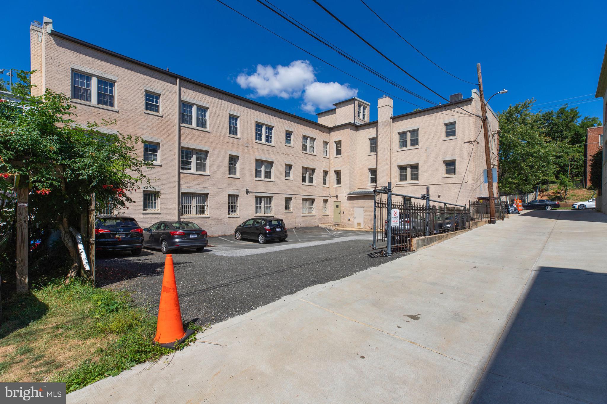 2625 3rd Street Northeast, Unit 203 Washington, DC 20002 - Photo 25 of 25 a view of a building with car parked