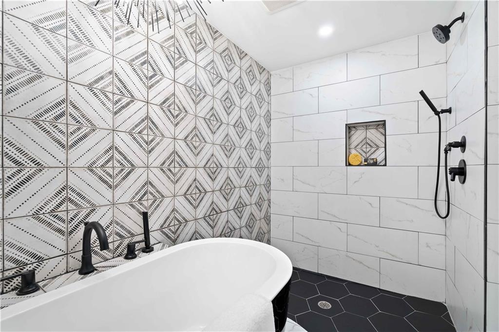 710 Cedar Avenue Pittsburgh, PA 15212 - Photo 23 of 25 a bathroom with a sink and a shower
