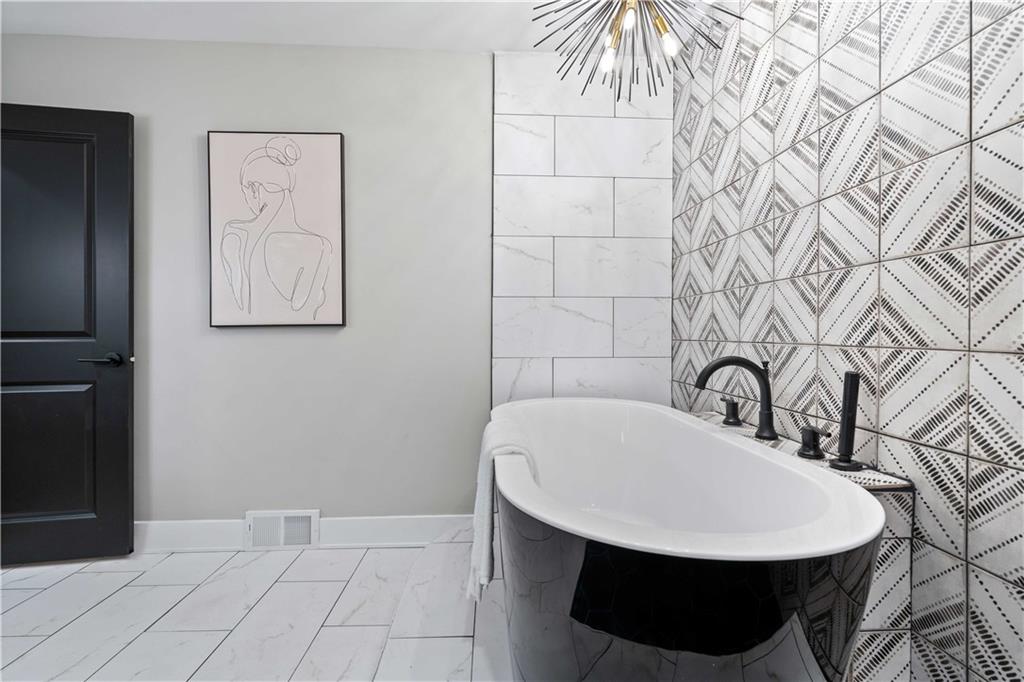 710 Cedar Avenue Pittsburgh, PA 15212 - Photo 25 of 25 a bathroom with a sink and mirror