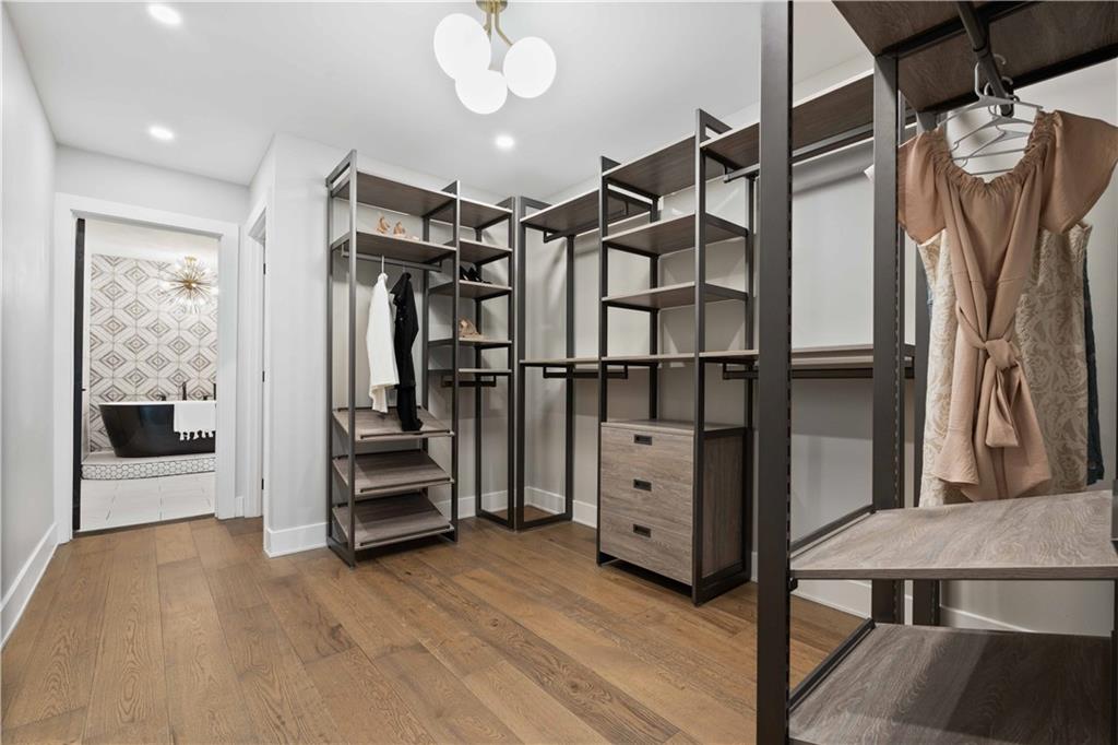 710 Cedar Avenue Pittsburgh, PA 15212 - Photo 8 of 25 a view of walk in closet with clothes and shoes