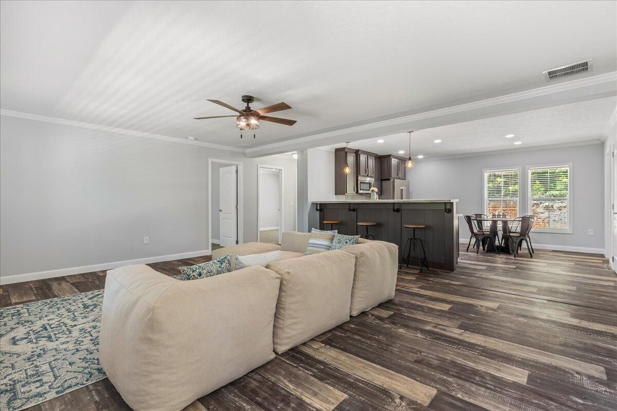 1629 Wasson Road Ten Mile, TN 37880 - Photo 10 of 27 a living room with furniture and a wooden floor