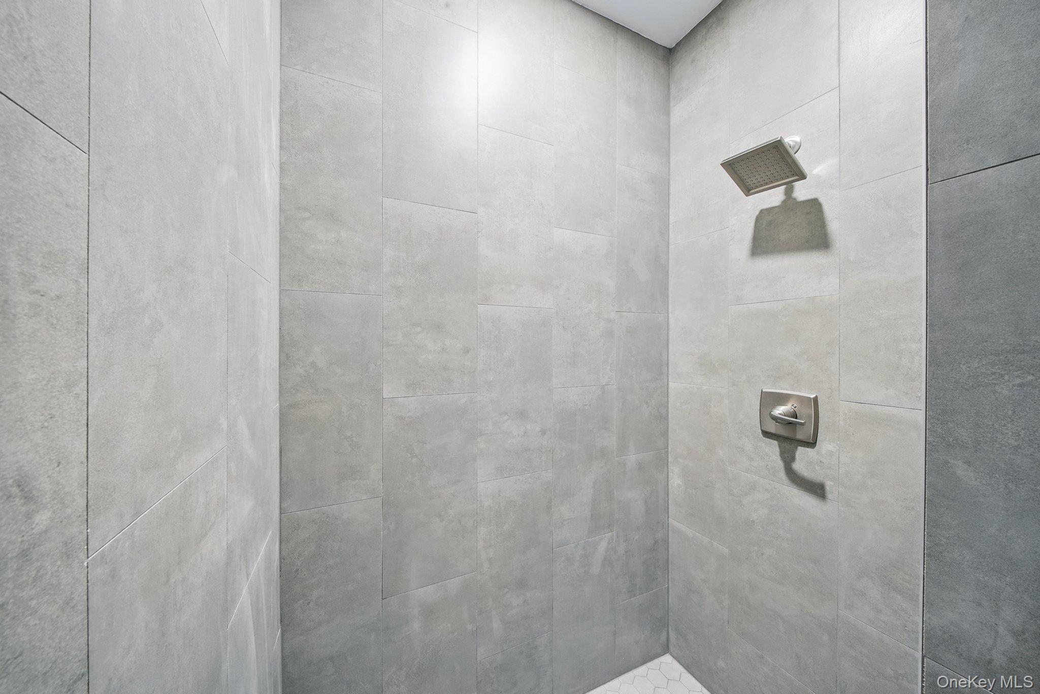 6 Giada Lane, Unit 6 Middletown, NY 10940 - Photo 21 of 29 a bathroom with a shower