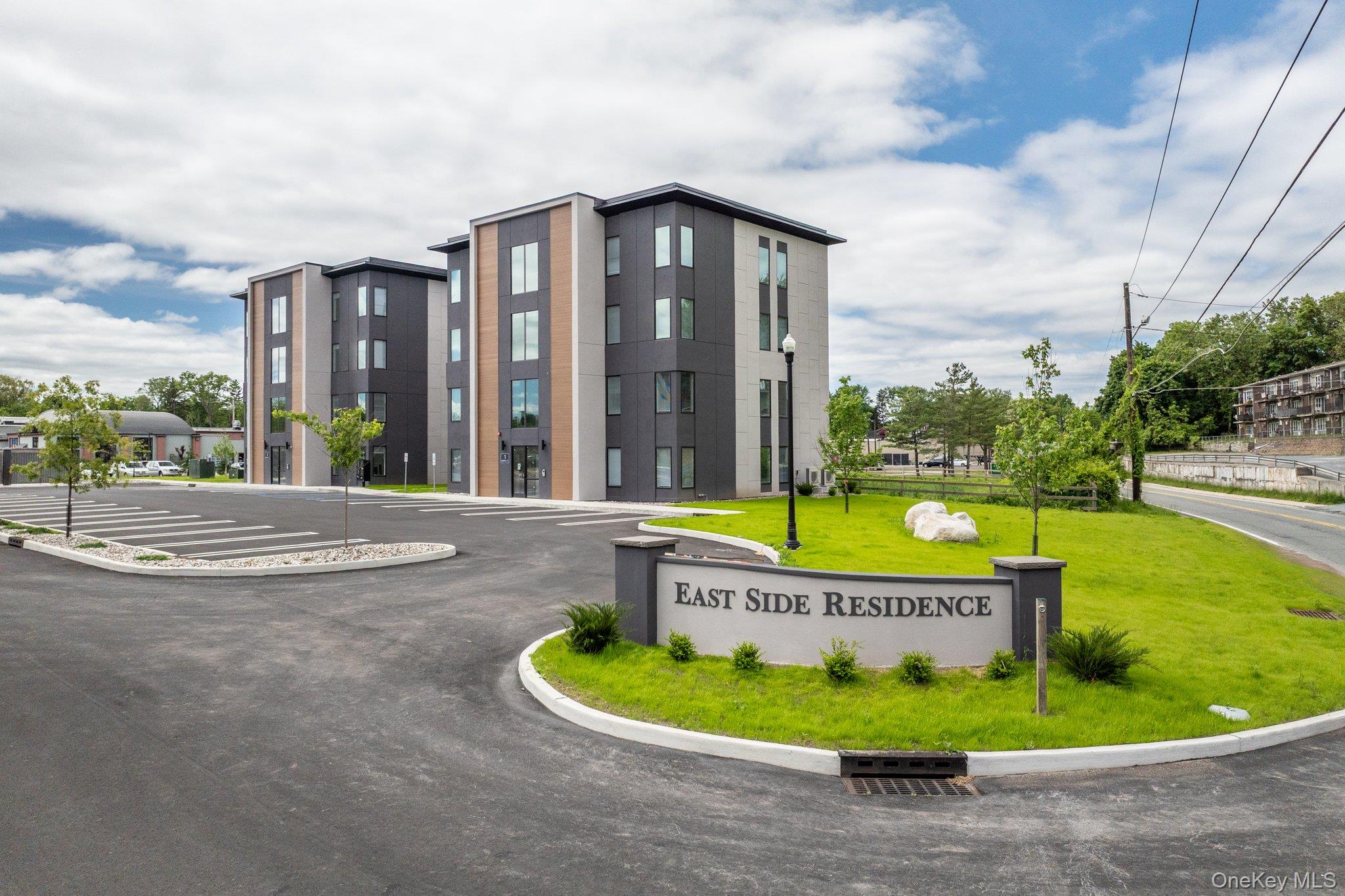 6 Giada Lane, Unit 6 Middletown, NY 10940 - Photo 4 of 29 a sign on the side of the road