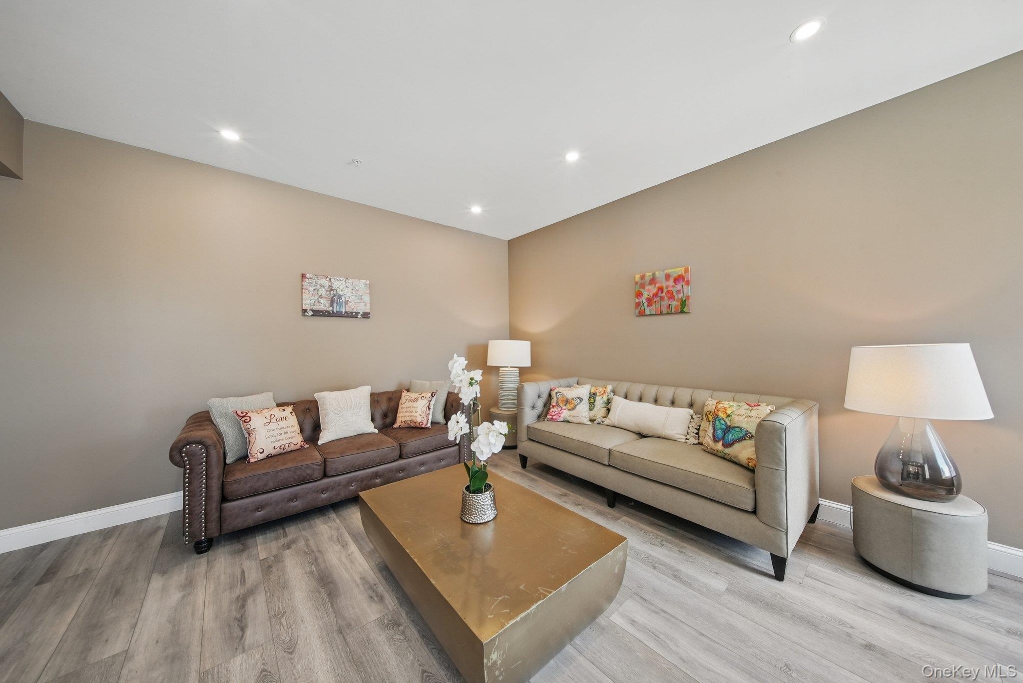 6 Giada Lane, Unit 6 Middletown, NY 10940 - Photo 8 of 29 a living room with furniture and a couch