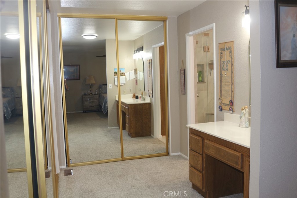 9453 Sharon Way Calimesa, CA 92320 - Photo 12 of 15 a bathroom with a sink and a mirror