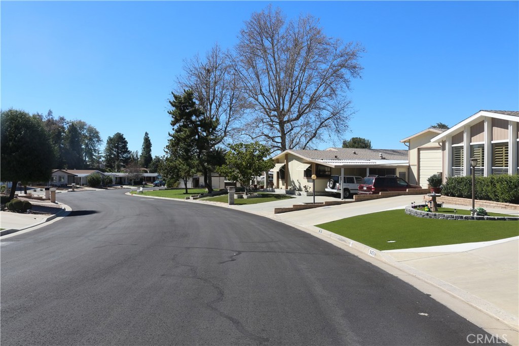 9453 Sharon Way Calimesa, CA 92320 - Photo 5 of 15 a view of a street with houses