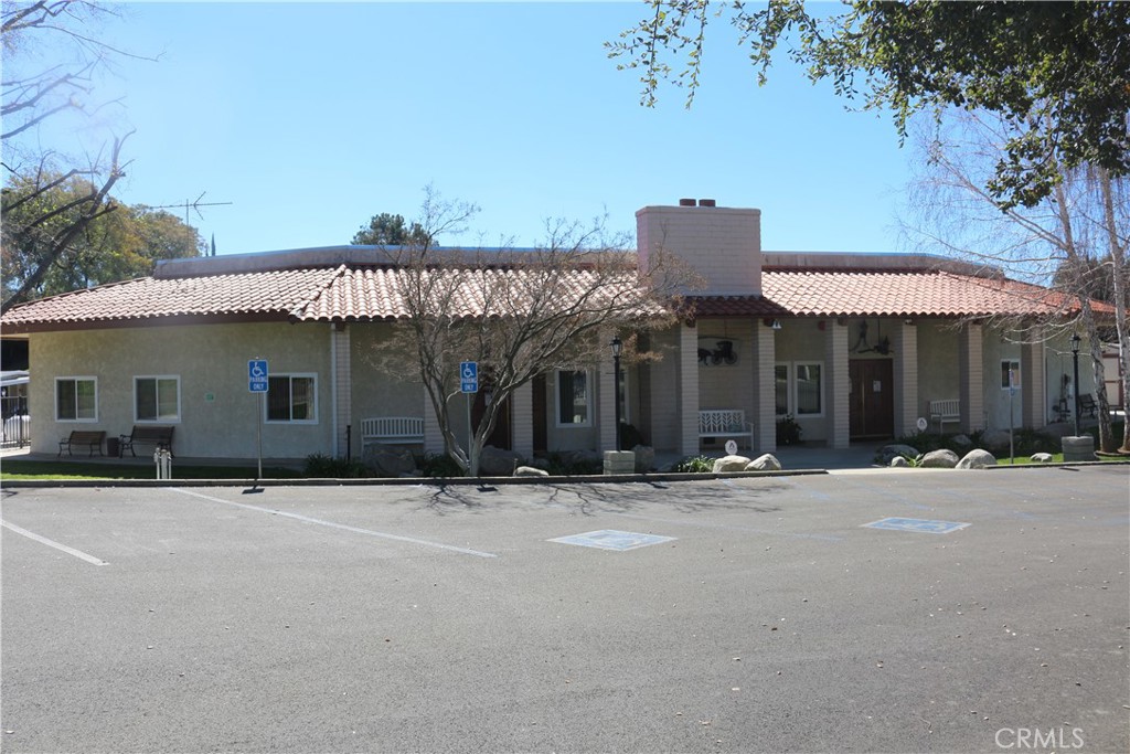 9453 Sharon Way Calimesa, CA 92320 - Photo 6 of 15 a front view of a house with a yard