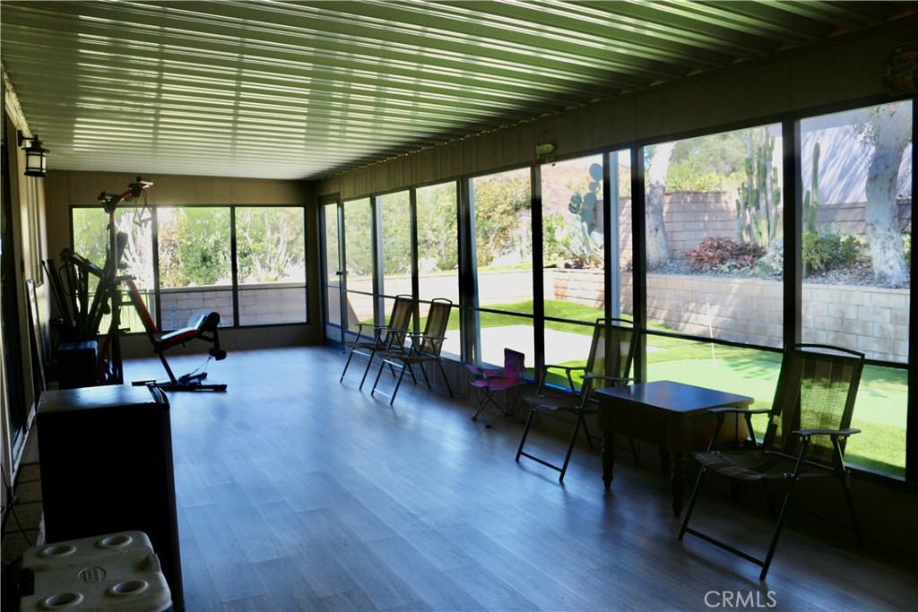 9453 Sharon Way Calimesa, CA 92320 - Photo 8 of 15 a living room with furniture and a large window