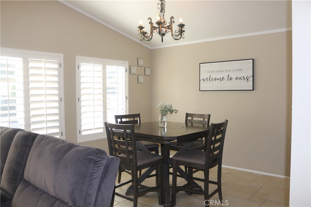 9453 Sharon Way Calimesa, CA 92320 - Photo 9 of 15 a view of a dining room with furniture window and outside view
