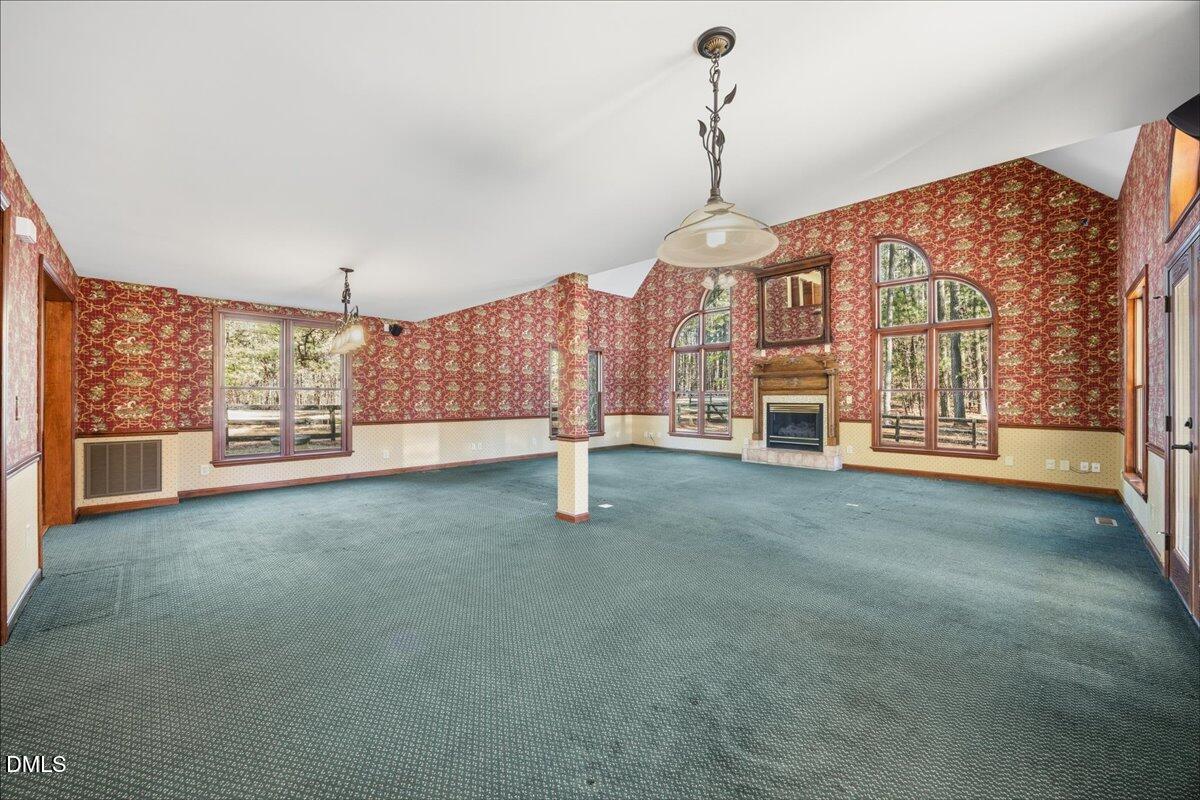 13616 New Light Road Raleigh, NC 27614 - Photo 12 of 60 a view of an empty room with a window