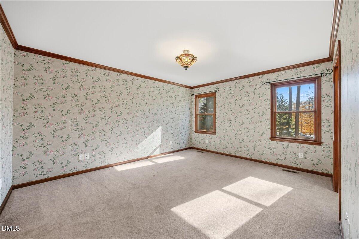 13616 New Light Road Raleigh, NC 27614 - Photo 15 of 60 a view of an empty room with a window