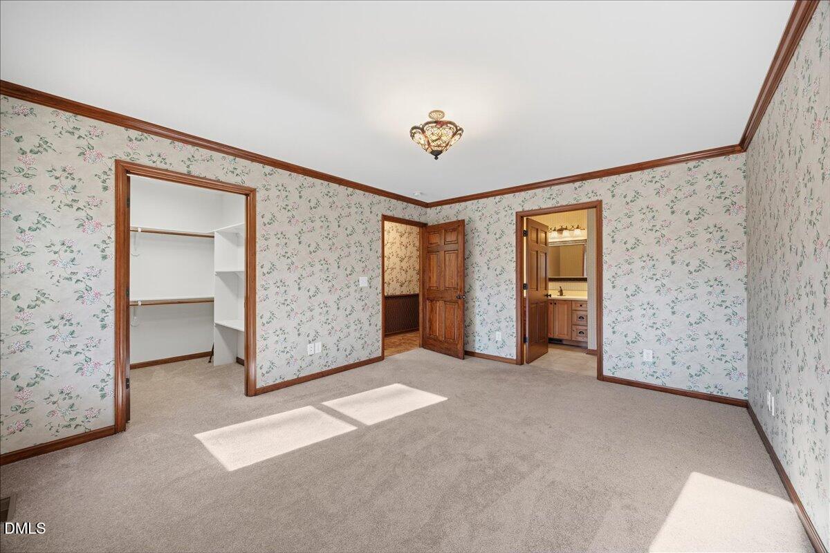 13616 New Light Road Raleigh, NC 27614 - Photo 16 of 60 an empty room with closet