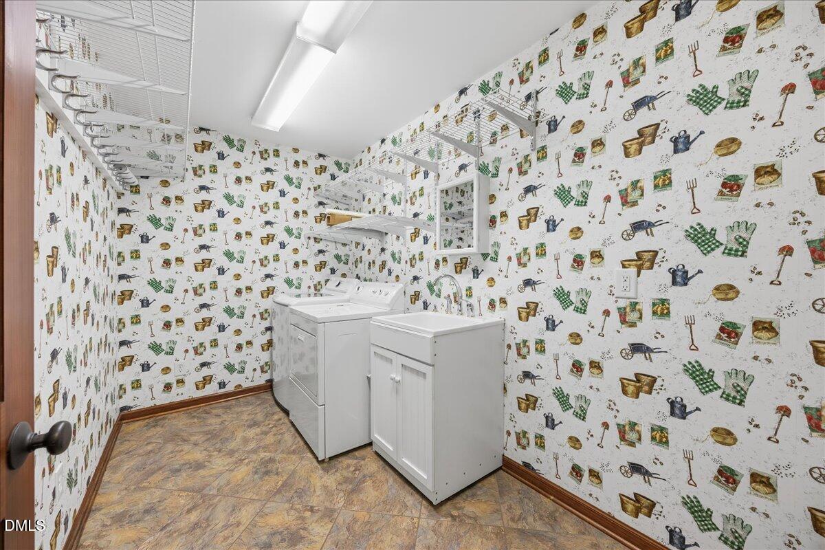 13616 New Light Road Raleigh, NC 27614 - Photo 18 of 60 a bathroom with a shower and a sink