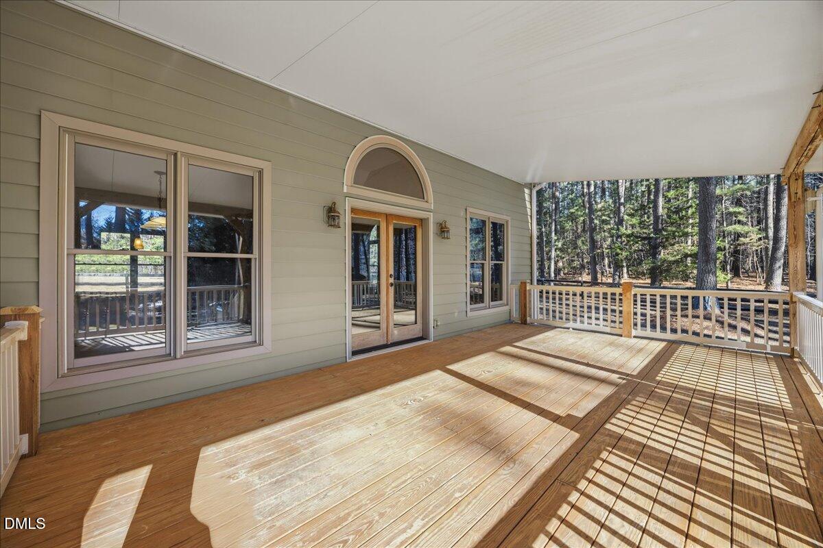 13616 New Light Road Raleigh, NC 27614 - Photo 35 of 60 a bedroom with a bed and a large window