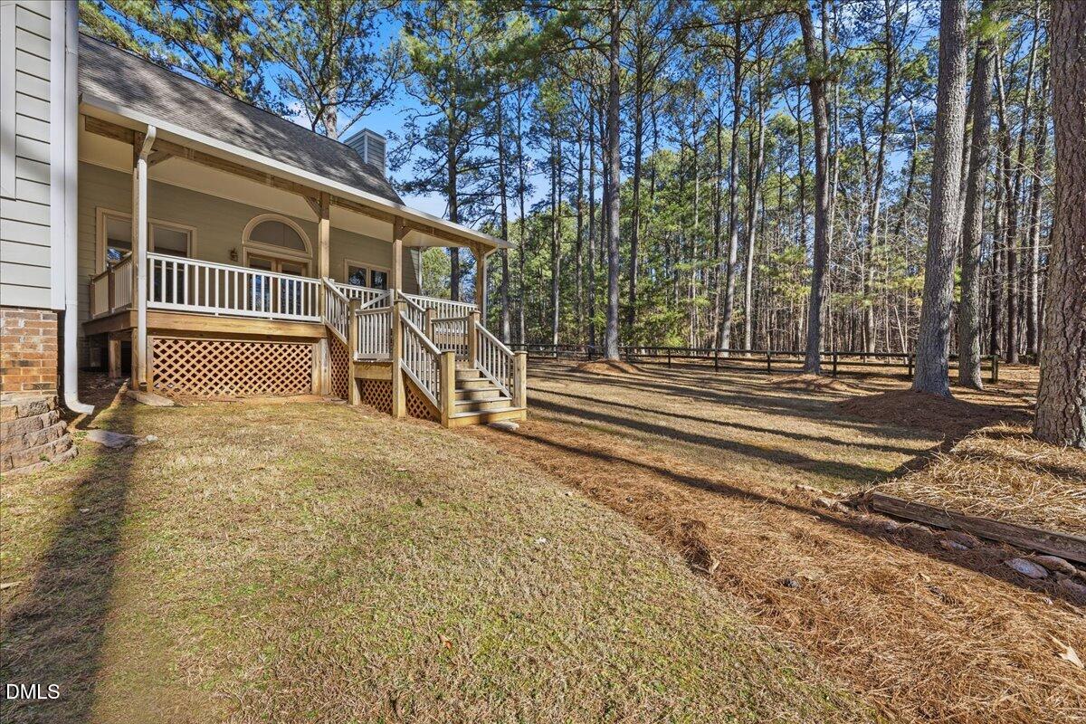13616 New Light Road Raleigh, NC 27614 - Photo 36 of 60 a view of a house with a yard