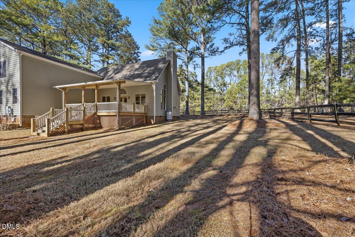13616 New Light Road Raleigh, NC 27614 - Photo 37 of 60 a front view of a house with a yard