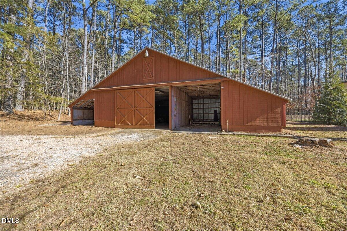 13616 New Light Road Raleigh, NC 27614 - Photo 38 of 60 a house with trees in front of it