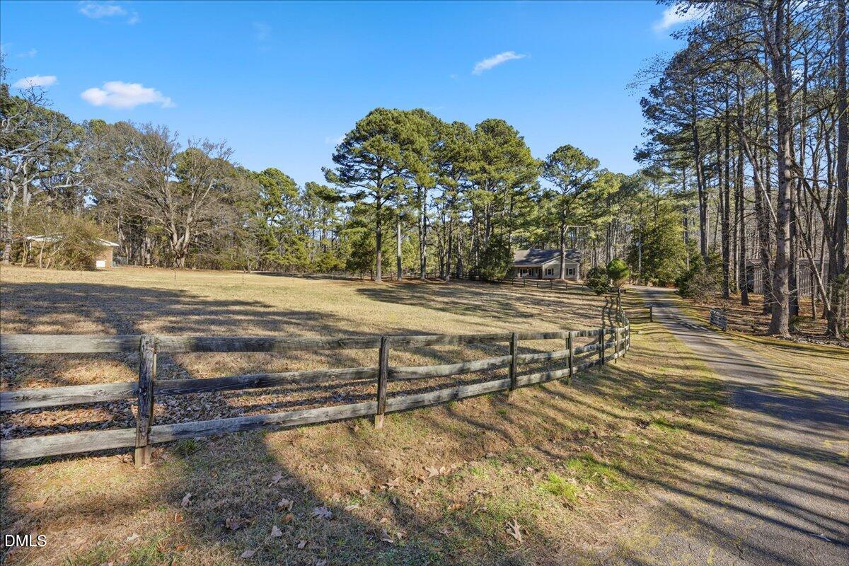 13616 New Light Road Raleigh, NC 27614 - Photo 46 of 60 a view of a yard with trees